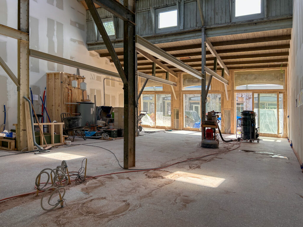 The self-laid terrazzo floor is sanded increasingly smooth.